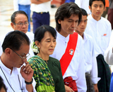Myanmar Democracy leader Aung San Suu Kyi and her youngest son Kim Aris visit Shwedagon Pagoda on Tuesday, 12 July, 2011, Yangon Myanmar.