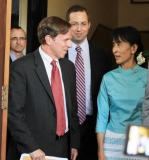 Myanmar democracy icon Aung San Suu Kyi, meet Derek Mitchell, U.S. special envoy to Myanmar, and U.S. Assistant Secretary of State for Democracy, Human Rights and Labor Michael Posner, at her lake side home on Friday,Nov.4, 2011, in Yangon, Myanmar.