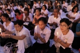 Activists pray at Botataung pagoda to release political prisoners on Sunday, Nov.20, 2011, in Yangon, Myanmar. About 200 activists take part in this event.