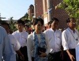 Aung San Suu Kyi attend 100th founding anniversary of St.Mary Cathedral and funeral of U Lwin on Thursday, December 8, 2011, in Yangon, Myanmar.