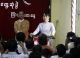 Aung San Suu Kyi speaks during a meeting with NLD Youth generation