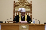 Members of parliament attend a regular session of parliament of upper house and lower house at parliament buildings in Naypyitaw, Myanmar, Monday, April.23, 2012.