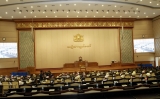 Members of parliament attend a regular session of parliament of upper house and lower house at parliament buildings in Naypyitaw, Myanmar, Monday, April.23, 2012.