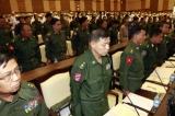 Military representative swear during a session at parliament buildings in Naypyitaw, Myanmar, Monday, April.23, 2012.