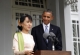 Myanmar opposition leader Aung San Suu Kyi, left, talks to journalists after meeting with U.S. President Barack Obama, right, at her lakeside residence Monday, Nov.19, 2012, in Yangon, Myanmar.(AP Photo/Khin Maung Win,Pool)