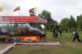 26-06-13 Photo Irrawaddy Police and officials conduct a public destruction of drugs on World Drug Day