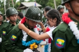 The residences cheered the Border Guard Force with garland as they marched towards the ground where the 4th Anniversary was held  (Photo – Sai Zaw/ The Irrawaddy)