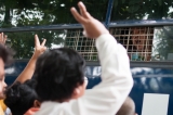 Ko Htin Kyaw, who have been charged for holding a protest, demonstrating as if he did not believe the Government at Shwe Pyi Thar Township court on 11th September and his supporters. (Photo – Sai Zaw/ Irrawaddy)