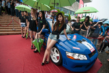 The models at the Sports Car Competition held during Myanmar Gaming Festival at Thuwunna Stadium on 6th September. (Photo – Sai Zaw/ Irrawaddy)