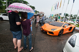 The racers ran a sports car competition during Myanmar Gaming Festival held at Thuwunna Stadium on 6th September. The luxury sports cars such as Lamborghini and Aston Martin came by to compete.   (Photo – Sai Zaw/ Irrawaddy)