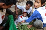 Two Red Cross members were injured during an attack by Kokang rebels according to the Myanmar army,on Red Cross convoy carrying war refugees from Laukkai on Feb. 17, 2015, where insurgents are in conflict with the Burma Army. (Photo: JPaing / The Irrawaddy)