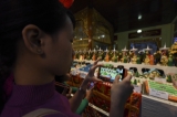 Devotees thronged to Shwedagon Pagoda on March 4, Full Moon Day of Tabaung. Buddhists did good deeds and paid homage to the pagoda. (Photo: Sai Zaw/The Irrawaddy)