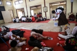 Student protesters rest in a monastery after police surrounded the monastery preventing them from proceeding with a protest march to Yangon from Letpadan, March 2. 2015. ( Photo - JPaing / The Irrawaddy)