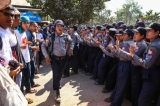 Student protesters shout slogans at the standoff in front of a monastery in Letpadan March 3. 2015. ( Photo - JPaing / The Irrawaddy)
