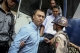 V Gastro Bar owner Tun Thurein, manager Htut Ko Ko Lwin and New Zealand national general manager Philip Blackwood, who used a Buddha image wearing headphones for promotion was sentenced to two-and-a-half-year in prison with hard labor on March 17, 2015. (Photo: Thaw Hein Htet/The Irrawaddy)