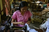 A woman working at tailoring shop funded by Japan as part of rehabilitation of leprosy patients and their families. (Only a few of children born from leprosy patients are infected with leprosy and they can live a normal life.) (Photo - teza hlaing / The Irrawaddy)