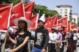 Workers staged a protest on May 1, Labor Day in Rangoon. Around 200 workers staged a protest march from Bo Sein Hman Sports Ground in Bahan Township to Kyaikkasan Stadium in Tamwe Township, calling for pay rise, release of arrested students and return of confiscated farmland. (Photo: Sai Zaw/The Irrawaddy)