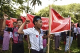 Workers staged a protest on May 1, Labor Day in Rangoon. Around 200 workers staged a protest march from Bo Sein Hman Sports Ground in Bahan Township to Kyaikkasan Stadium in Tamwe Township, calling for pay rise, release of arrested students and return of confiscated farmland. (Photo: Sai Zaw/The Irrawaddy)