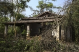 United Wa State Army (UWSA), despite its bitter fight against CPB, it does not demolish the headquarters of CBP which takes an important part in history. The abandoned headquarters stand in isolation amid bushes and dust. Photo: J Paing/The Irrawaddy.