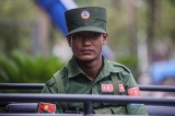 A soldier at inspection gate of Mengla troops on the Mengla-Panghsan road on March 29.