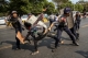 Police attack student protesters in Hledan, Yangon on March 10. (Photo: Thaw Hein Htet / The Irrawaddy)