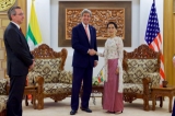 U.S. Secretary of State John Kerry, accompanied by U.S. Ambassador to Myanmar Scot Marciel, shakes hands with Myanmar Foreign Minister Aung San Suu Kyi before a bilateral meeting on May 22, 2016, at the Ministry of Foreign Affairs in Naypyitaw, Myanmar. [State Department photo/ Public Domain]