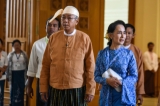 Aung San Suu Kyi, right, and President Htin Kyaw enter Parliament in March 2016. (Photo - JPaing/ The Irrawaddy)
