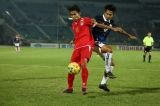 Myanmar player in action against Cambodia player during the AFF Suzuki Cup Group B soccer match in Thuwanna Football statdium in Yangon, Myanmar, November 23, 2016. Hein Htet/The Irrawaddy