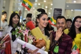 Htet Htet Htun, the Burmese contestant at the 2016 Miss Universe pageant, arrived in Rangoon on Tuesday evening from the Philippines, where the 65th annual contest was held. She was the first Burmese contestant to win the best national costume award in the competition. (Photos: Pyay Kyaw / The Irrawaddy)