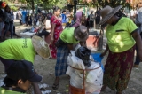 People collected wastes around Maha Bandula park at the last day of Thingyan, water festival, on April 16, 2019.  Photo - Htet Wai/ Irrawaddy