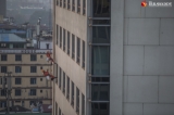 Window washers were seen at Sule Square Center on January 8, 2020.  Photo - Htet Wai/ Irrawaddy