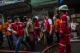 Firefighters extinguished a huge blaze in Than Zay, in Yangon's LathaTownship, at around 9:10 a.m, on February 20, 2020.  The fire started at 6:05 a.m. According to the Myanmar Fire Services Department, a total of 85 people and a pet dog were rescued during the search-and-rescue operation. Around 15 of them were injured and taken to Yangon General Hospital for treatment.  Photo - Htet Wai/ Irrawaddy