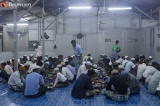 Muslims pray at a temporary site in South Dagon township in Yangon during Ramadan prayers on May 20, 2020.  The place was reopened two days after mobs forced local authorities to shut it down.   Photo - Htet Wai/ Irrawaddy